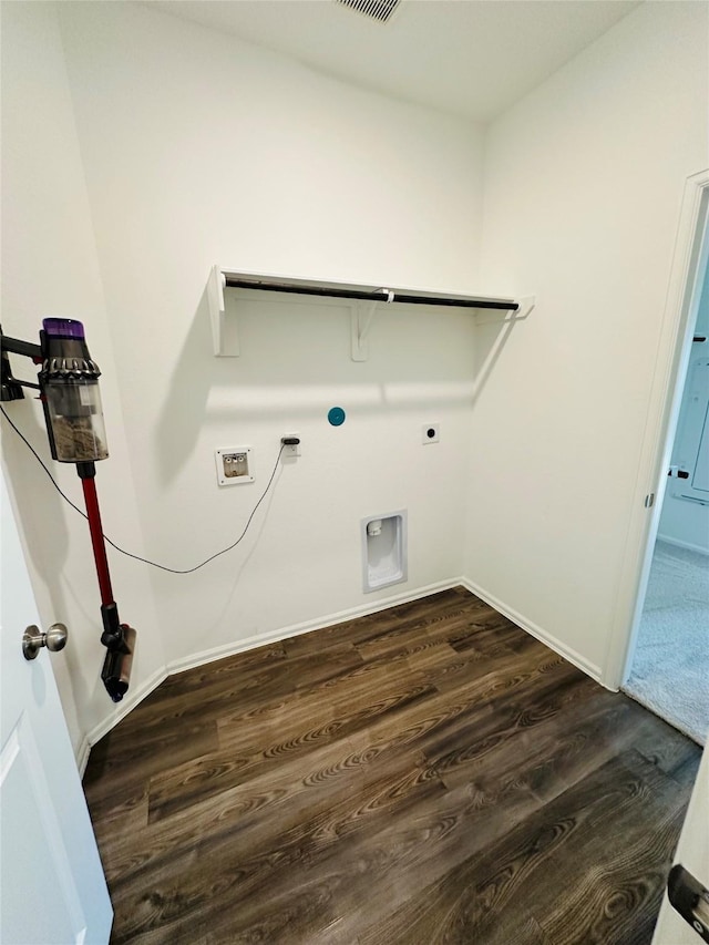 laundry room with dark hardwood / wood-style flooring and hookup for an electric dryer