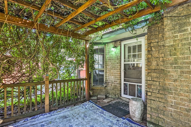 wooden deck featuring a pergola