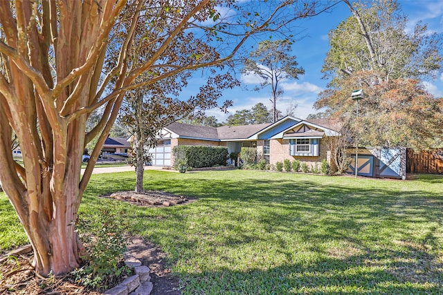 single story home featuring a shed and a front yard