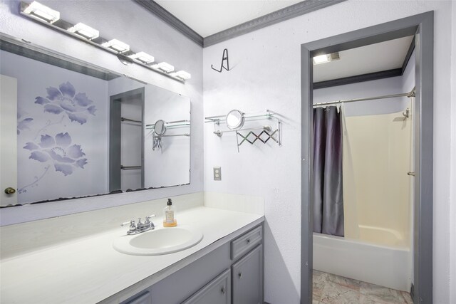 bathroom featuring vanity, shower / bathtub combination with curtain, and ornamental molding