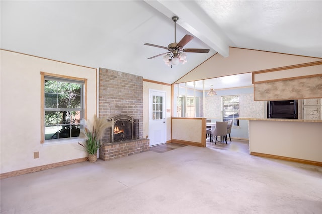 unfurnished living room featuring carpet flooring, vaulted ceiling with beams, a fireplace, and ceiling fan