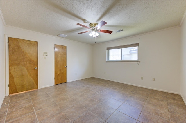 empty room with a textured ceiling, ceiling fan, and crown molding