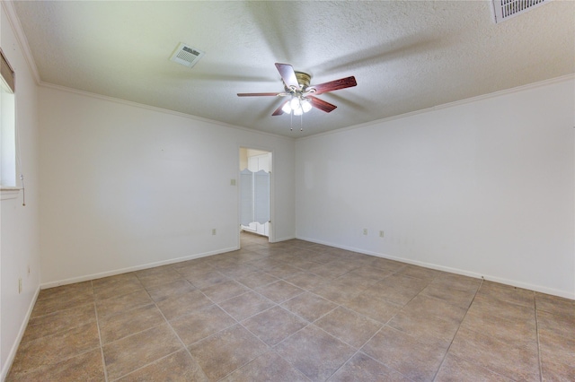 empty room featuring a textured ceiling, ceiling fan, light tile patterned floors, and crown molding