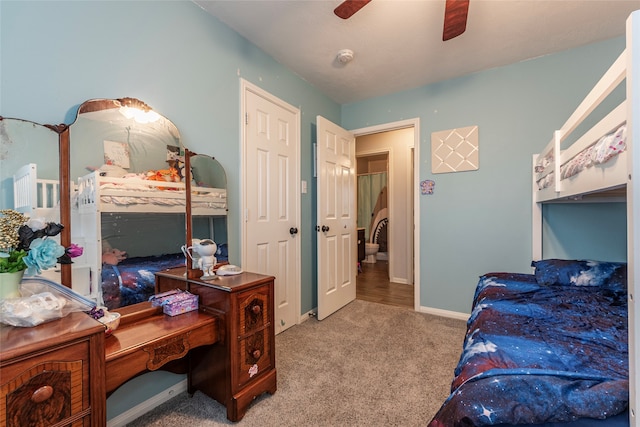 bedroom featuring ceiling fan and light colored carpet