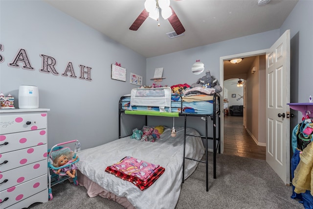 bedroom featuring hardwood / wood-style floors and ceiling fan