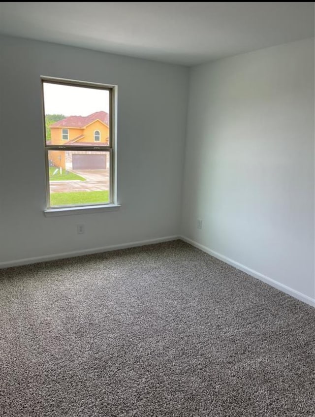 spare room with carpet floors