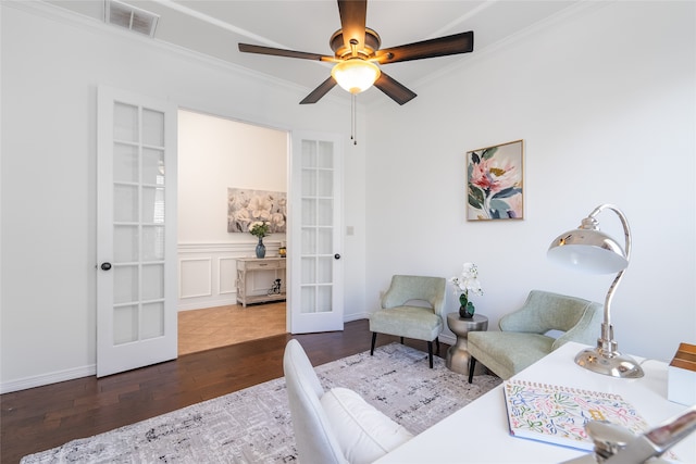 bedroom with french doors, crown molding, ceiling fan, and dark wood-type flooring