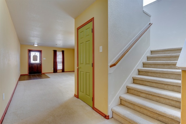 view of carpeted entryway