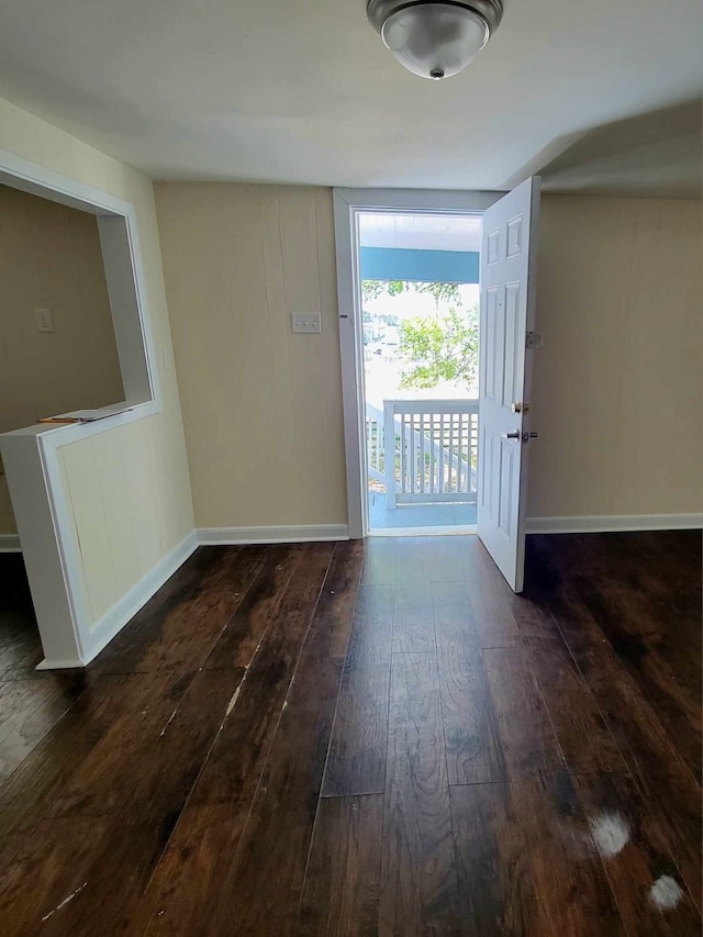 interior space with dark wood-type flooring