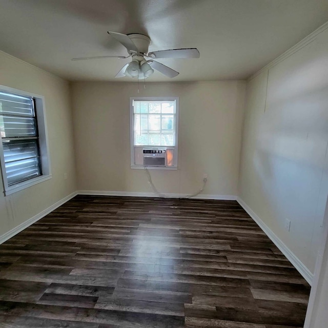 spare room with ceiling fan and dark wood-type flooring