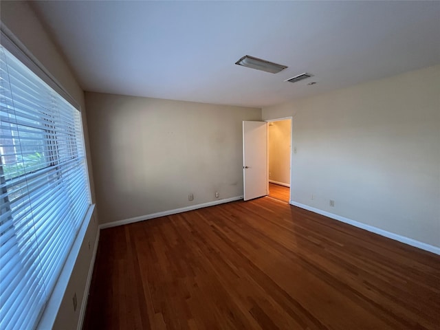 empty room featuring hardwood / wood-style floors