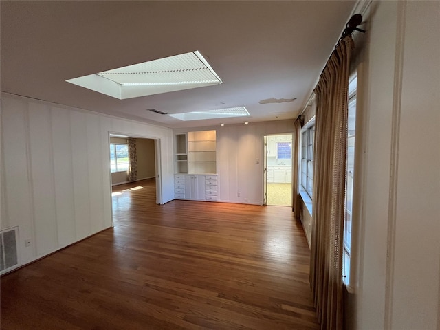 spare room featuring hardwood / wood-style floors