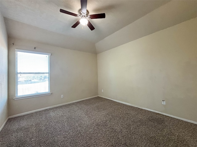 unfurnished room featuring carpet flooring, ceiling fan, and lofted ceiling