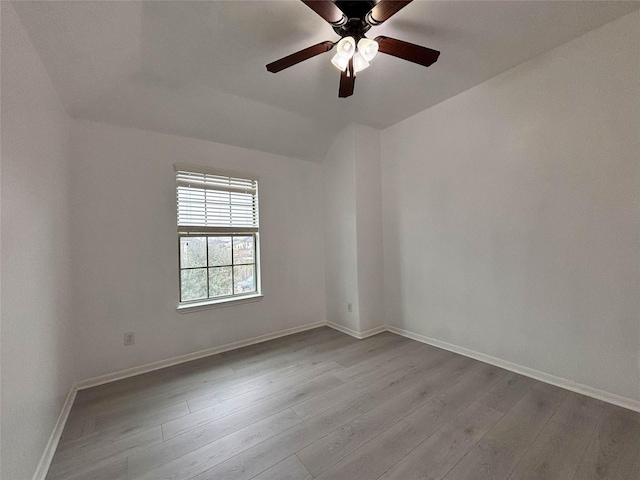 unfurnished room featuring light hardwood / wood-style flooring and ceiling fan