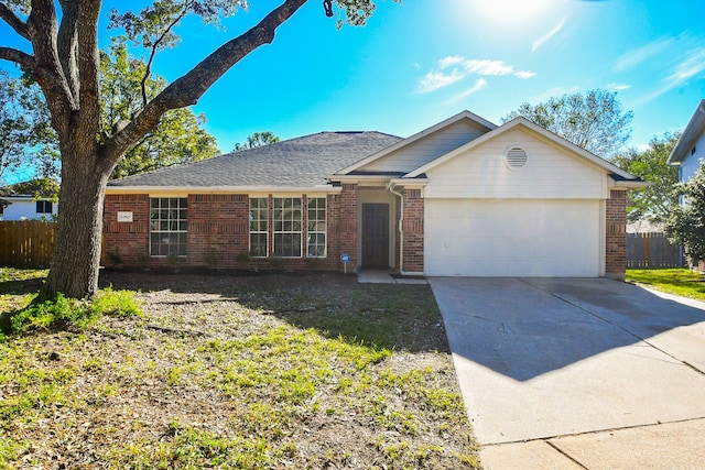 ranch-style home with a garage