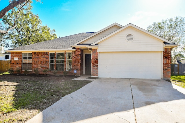 ranch-style home featuring a garage