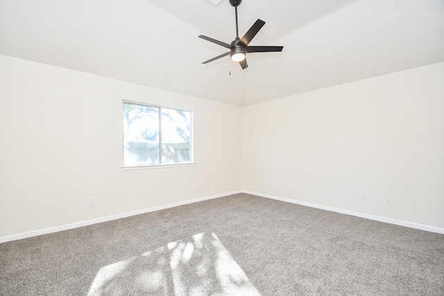 spare room with carpet and ceiling fan