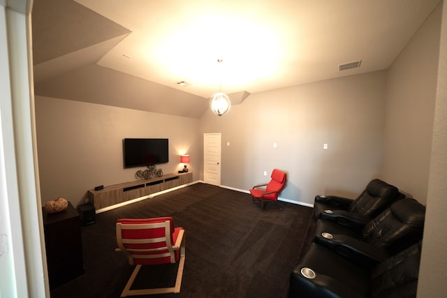 carpeted living room with lofted ceiling