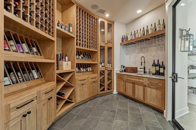 wine room featuring sink