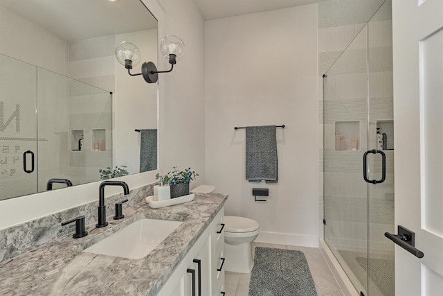 bathroom with walk in shower, tile patterned flooring, vanity, and toilet