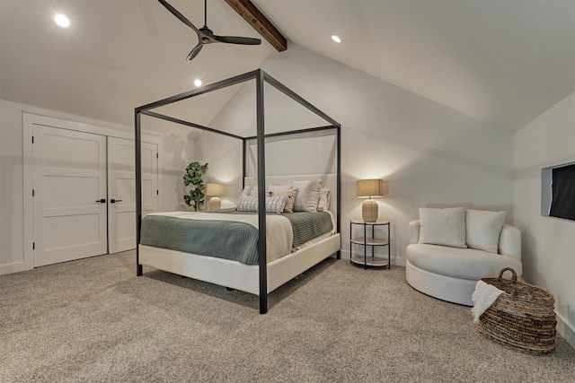 bedroom featuring vaulted ceiling with beams, ceiling fan, and carpet