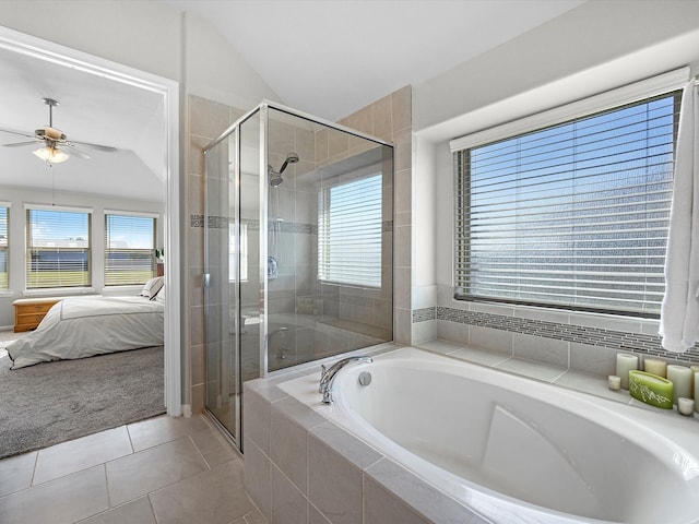 bathroom featuring tile patterned floors, ceiling fan, lofted ceiling, and independent shower and bath