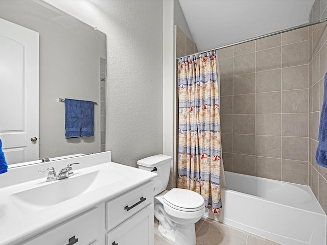 full bathroom with tile patterned flooring, vaulted ceiling, toilet, shower / bath combo with shower curtain, and vanity