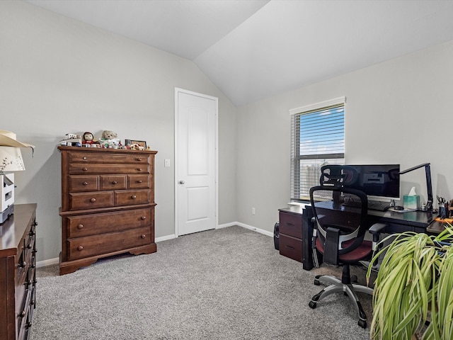 office area featuring carpet and vaulted ceiling