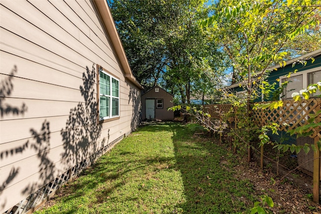 view of yard with a storage shed