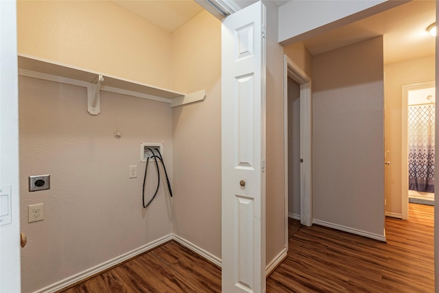 laundry room featuring washer hookup, electric dryer hookup, gas dryer hookup, and dark wood-type flooring