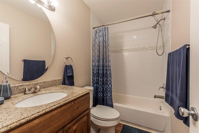 full bathroom featuring shower / bath combination with curtain, vanity, and toilet