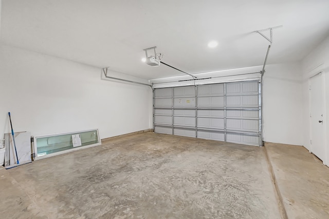 garage featuring a garage door opener