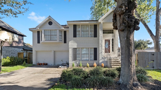 raised ranch featuring a garage