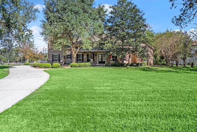 view of front of home with a front lawn