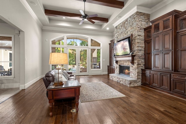 living room with baseboards, dark wood-type flooring, french doors, a fireplace, and beam ceiling