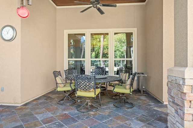 view of patio / terrace featuring a ceiling fan and outdoor dining space