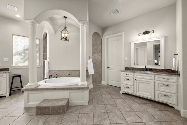 full bath with vanity, visible vents, and ornate columns