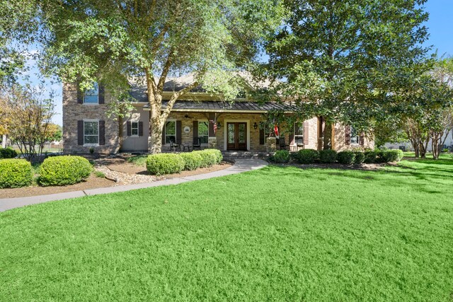 view of front of home featuring a front yard