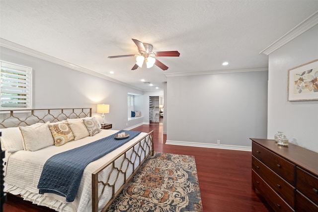 bedroom with a textured ceiling, ceiling fan, crown molding, and dark hardwood / wood-style floors