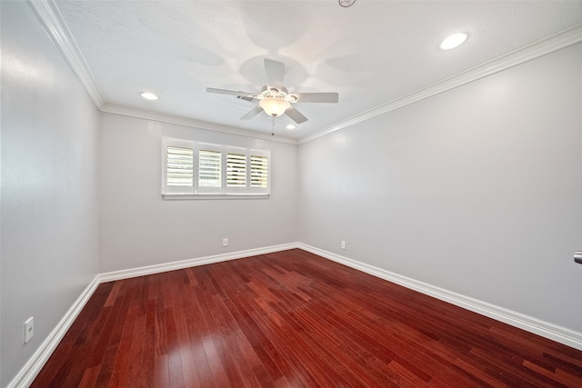 spare room with hardwood / wood-style flooring, ceiling fan, and ornamental molding