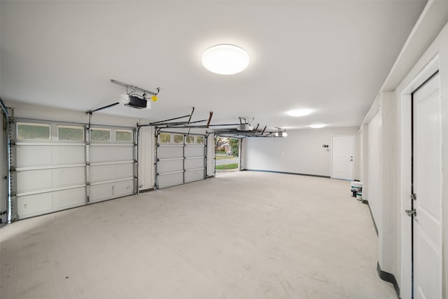 garage featuring a garage door opener