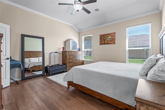 bedroom featuring multiple windows, wood-type flooring, ceiling fan, and lofted ceiling