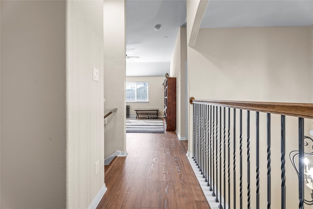 hall with dark hardwood / wood-style floors