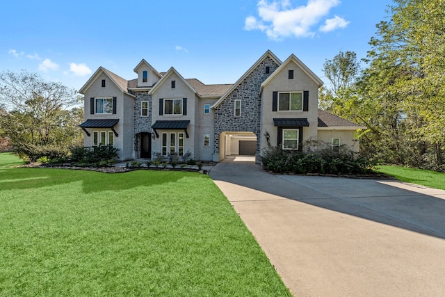 view of front facade featuring metal roof, concrete driveway, a front lawn, and a standing seam roof