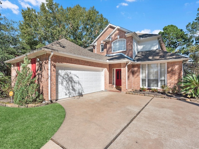 8311 Vaulted Pine Dr, Humble, TX 77346 - traditional-style house with brick siding, a garage, driveway, and roof with shingles