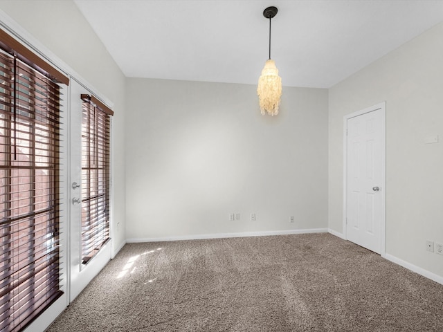 8311 Vaulted Pine Dr, Humble, TX 77346 - spare room with healthy amount of natural light, carpet floors, and baseboards
