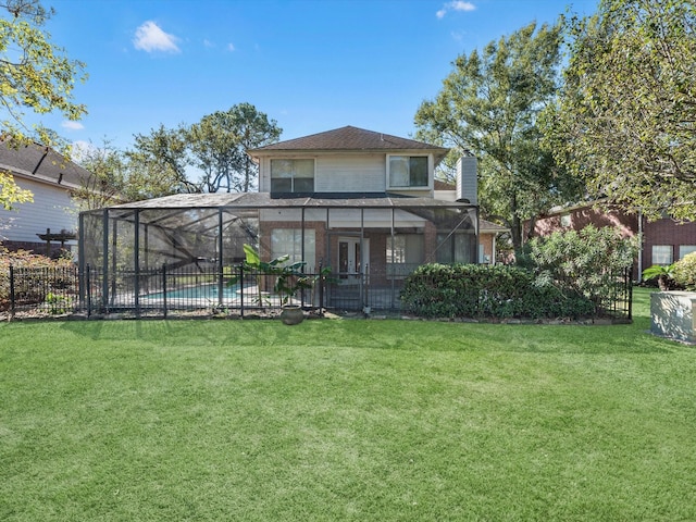 8311 Vaulted Pine Dr, Humble, TX 77346 - rear view of house featuring a chimney, a lanai, french doors, and a patio