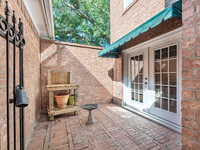 8311 Vaulted Pine Dr, Humble, TX 77346 - view of patio with french doors