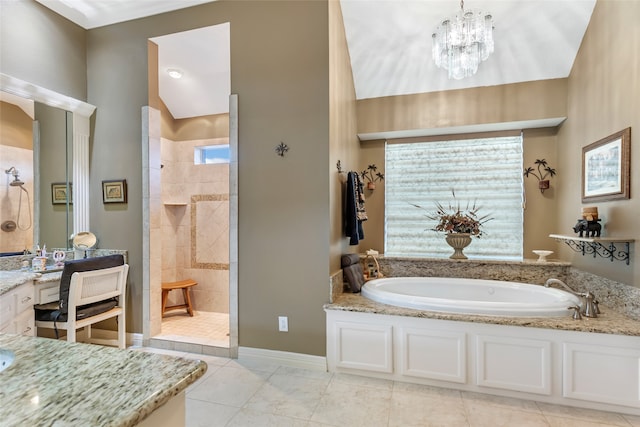 bathroom featuring vanity, an inviting chandelier, tile patterned floors, vaulted ceiling, and separate shower and tub