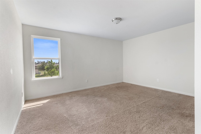 unfurnished room featuring carpet floors